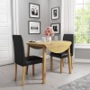 New Haven Oak Set with Round Drop Leaf Dining Table &amp; 2 Black Faux Leather Chairs