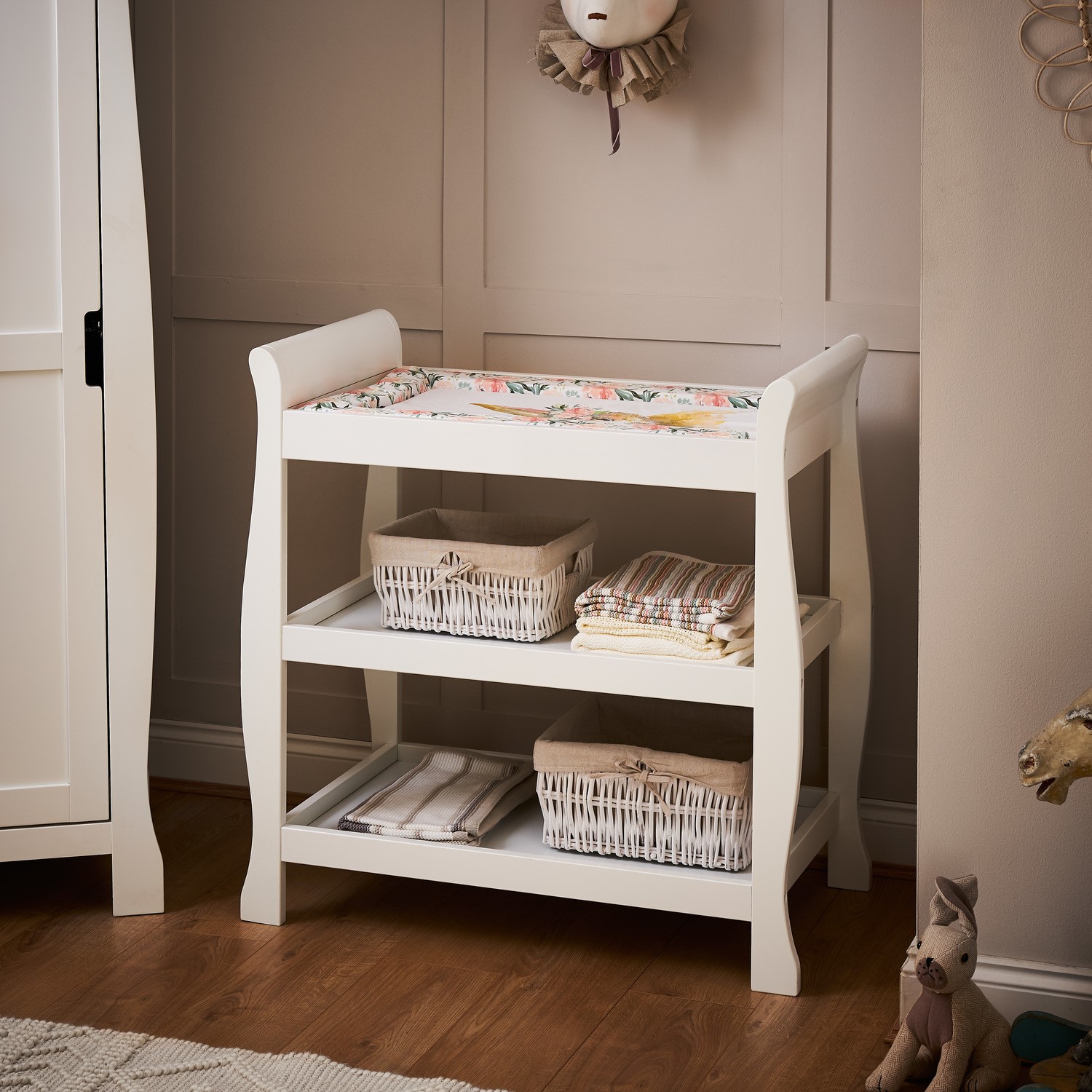Photo of Stamford white sleigh open changing table with storage- obaby