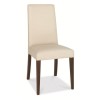 GRADE A1 - Bentley Designs Akita Pair of Faux Cream Leather Dining Chairs