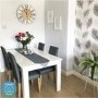 GRADE A2 - White Extendable Dining Table with High Gloss Finish - 6 Seater - Vivienne