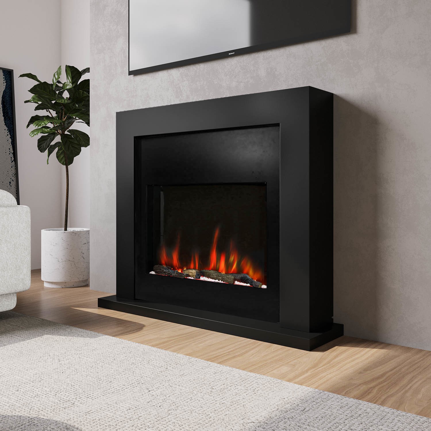 Photo of Black free standing electric fireplace suite with customisable exposed fuel bed - amberglo
