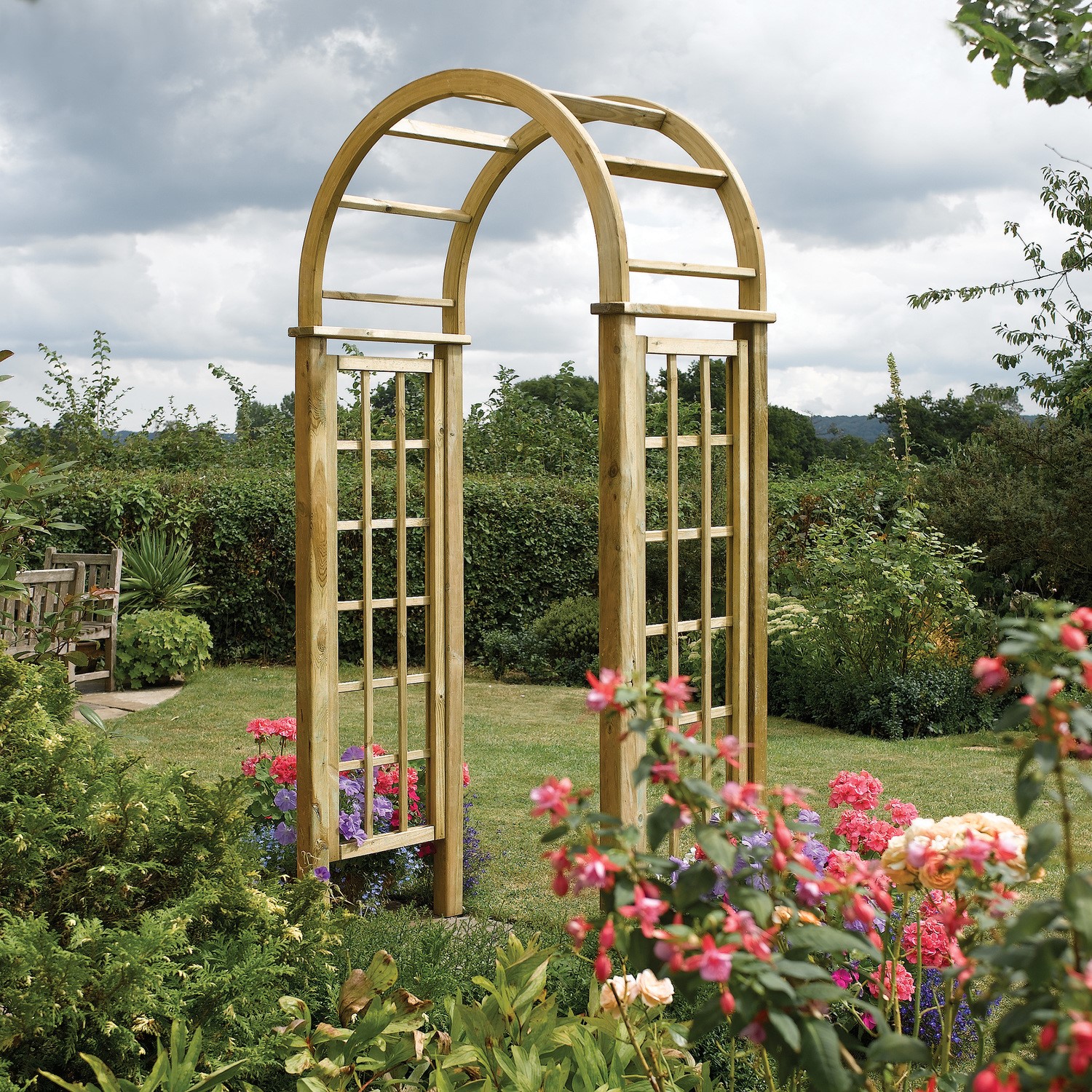 Photo of Rowlinson wooden garden arch with round top and trellis