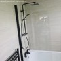 Single Ended Round Bath 1700 x 750mm with Front Panel and 1450mm Hinged Black Bath Screen - Alton