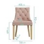 White Round Dining Table with 4 Pink Velvet Dining Chairs