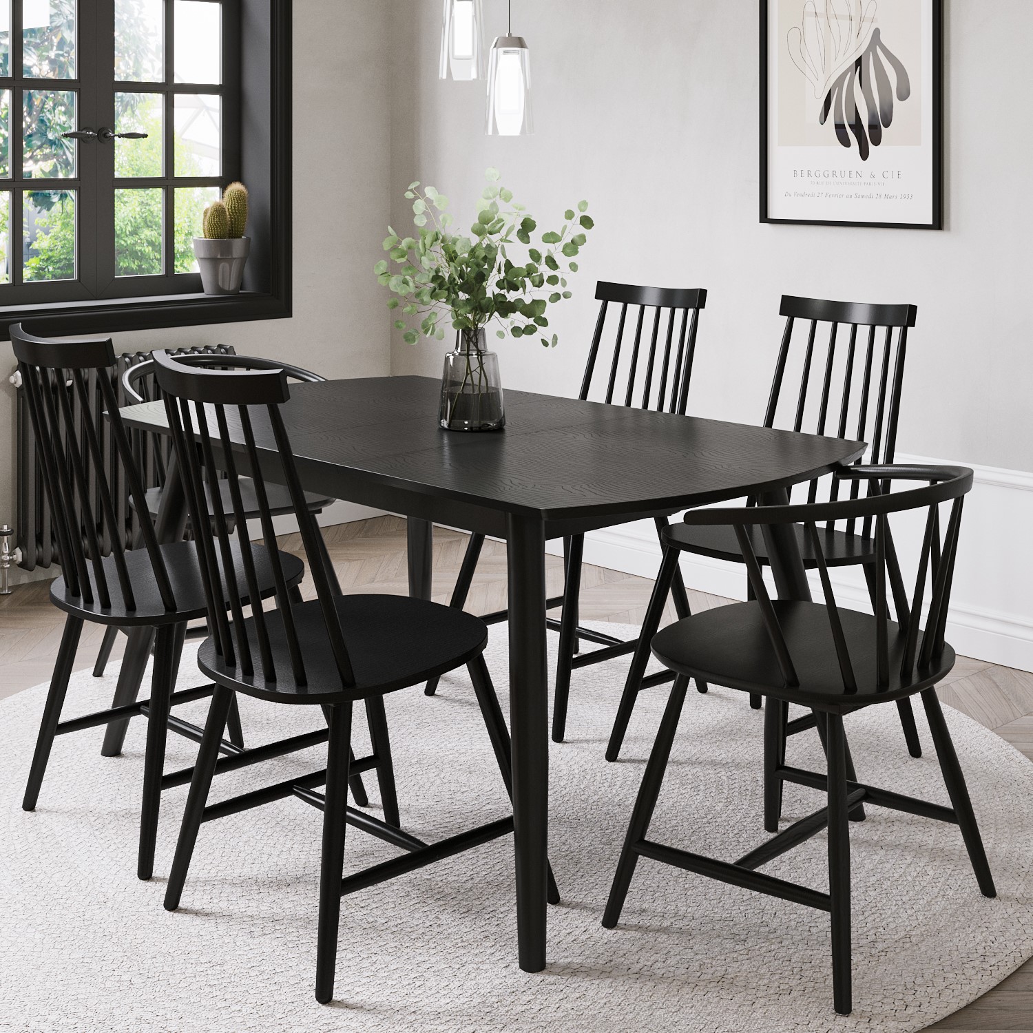 Photo of Black wooden extendable dining table with 4 spindle dining chairs & 2 curved back spindle dining chairs - olsen