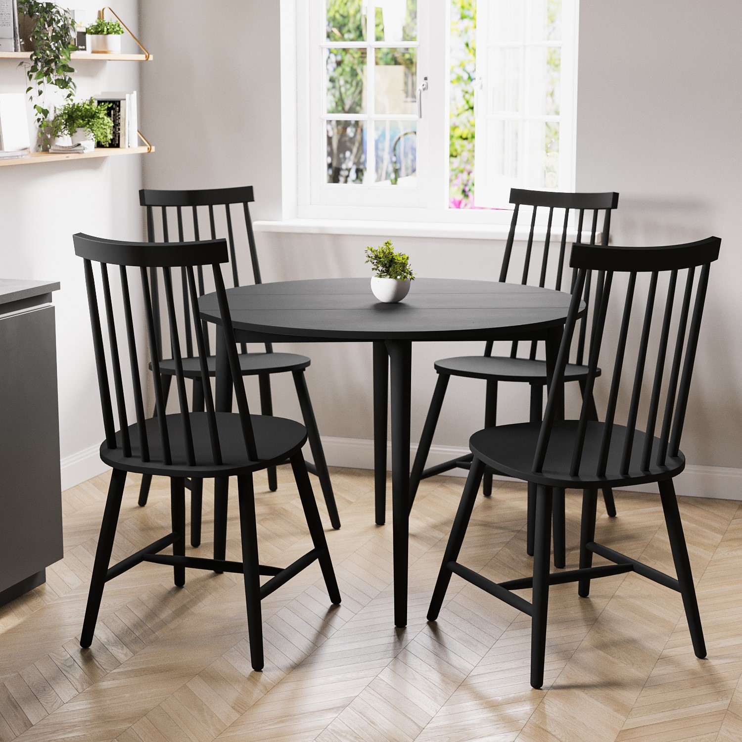 Photo of Round black folding drop leaf dining table with 4 wooden spindle dining chairs - rudy