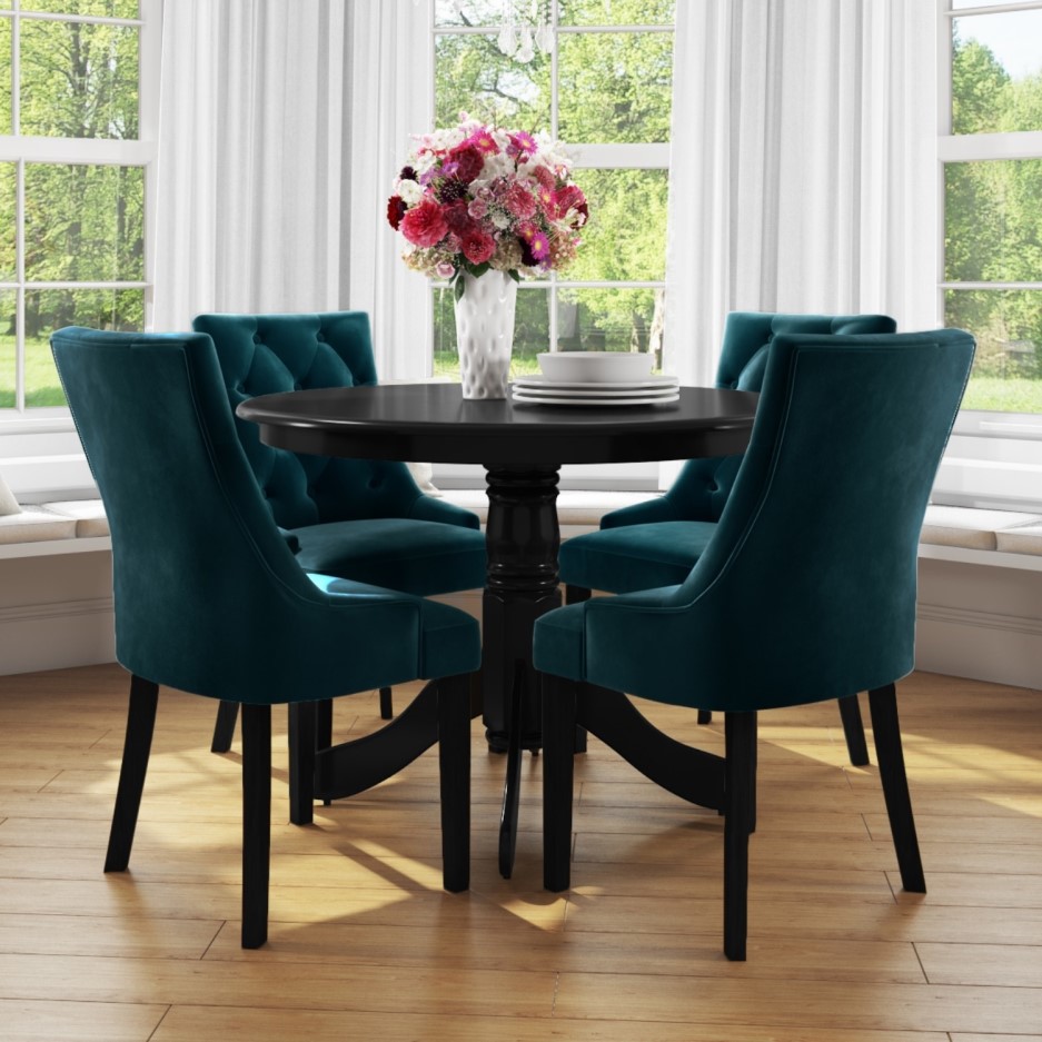 small round dining table in black with 4 teal blue velvet