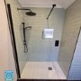 1100mm Black Frameless Wet Room Shower Screen - Corvus