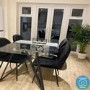GRADE A1 - Glass Dining Table with Black Metal Legs- Seats 6 - Dax