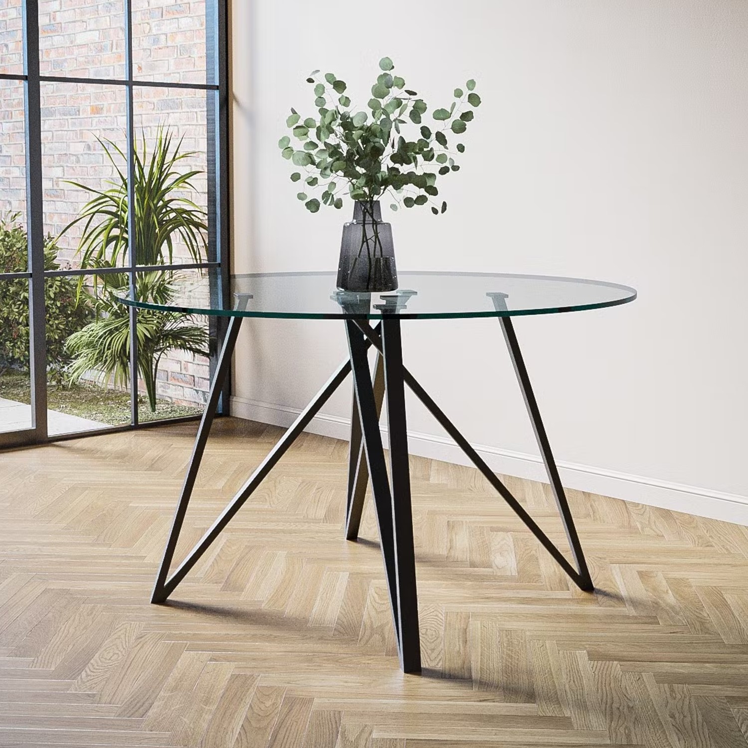 Photo of Round glass dining table with black legs - seats 4 - dax