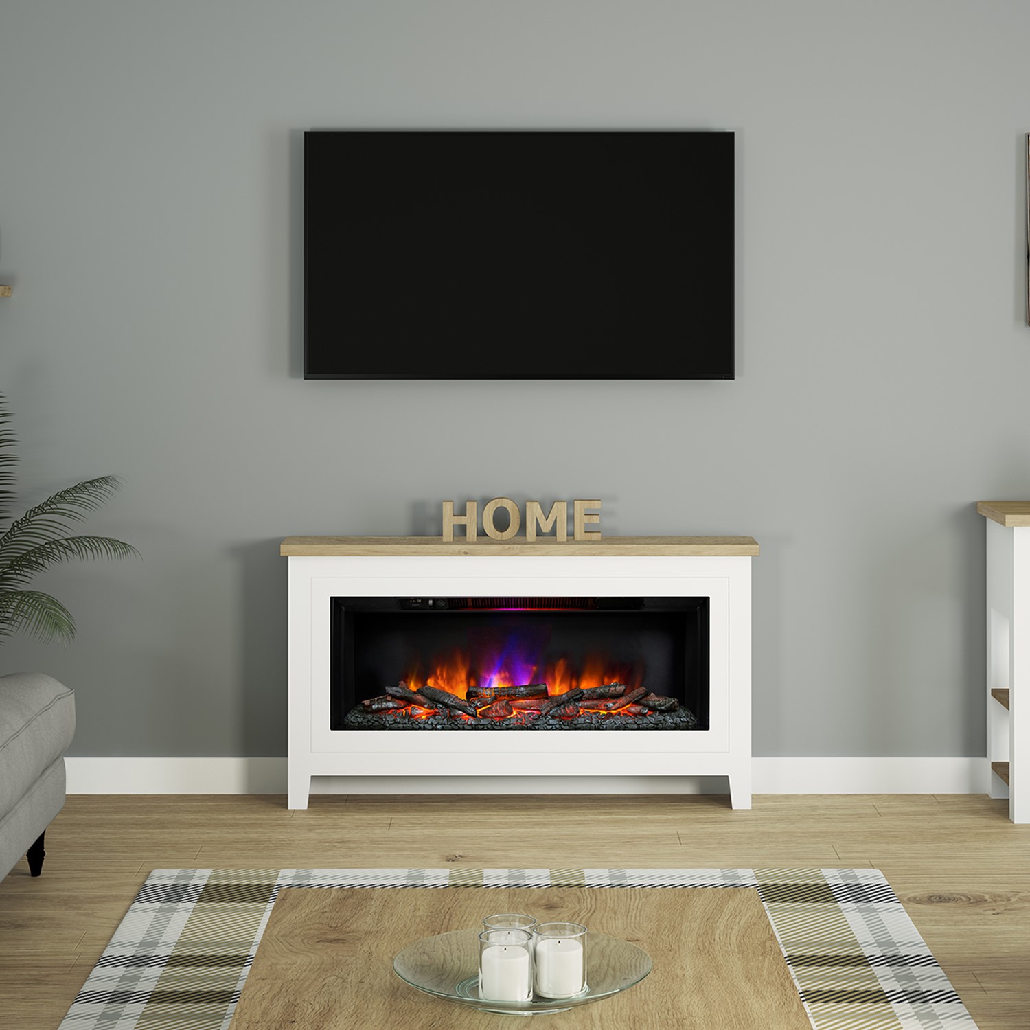 Photo of White freestanding electric fireplace suite with realistic log fuel bed - be modern poulton