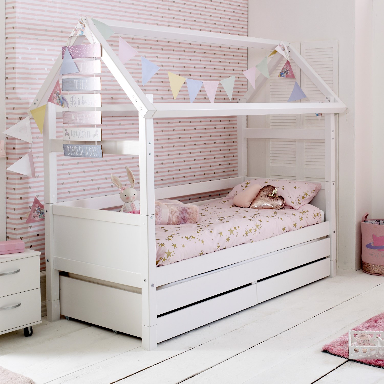 Photo of White wooden house bed with trundle and storage drawers - nordic - kids avenue