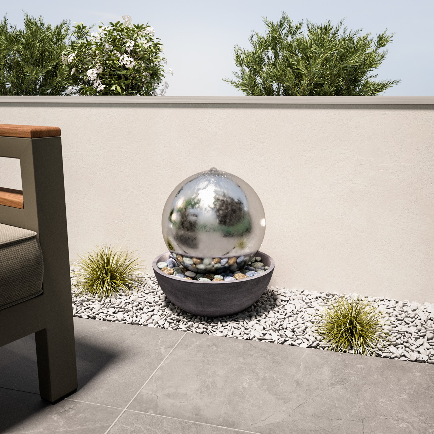 Photo of Stainless steel sphere in bowl water feature with led lights