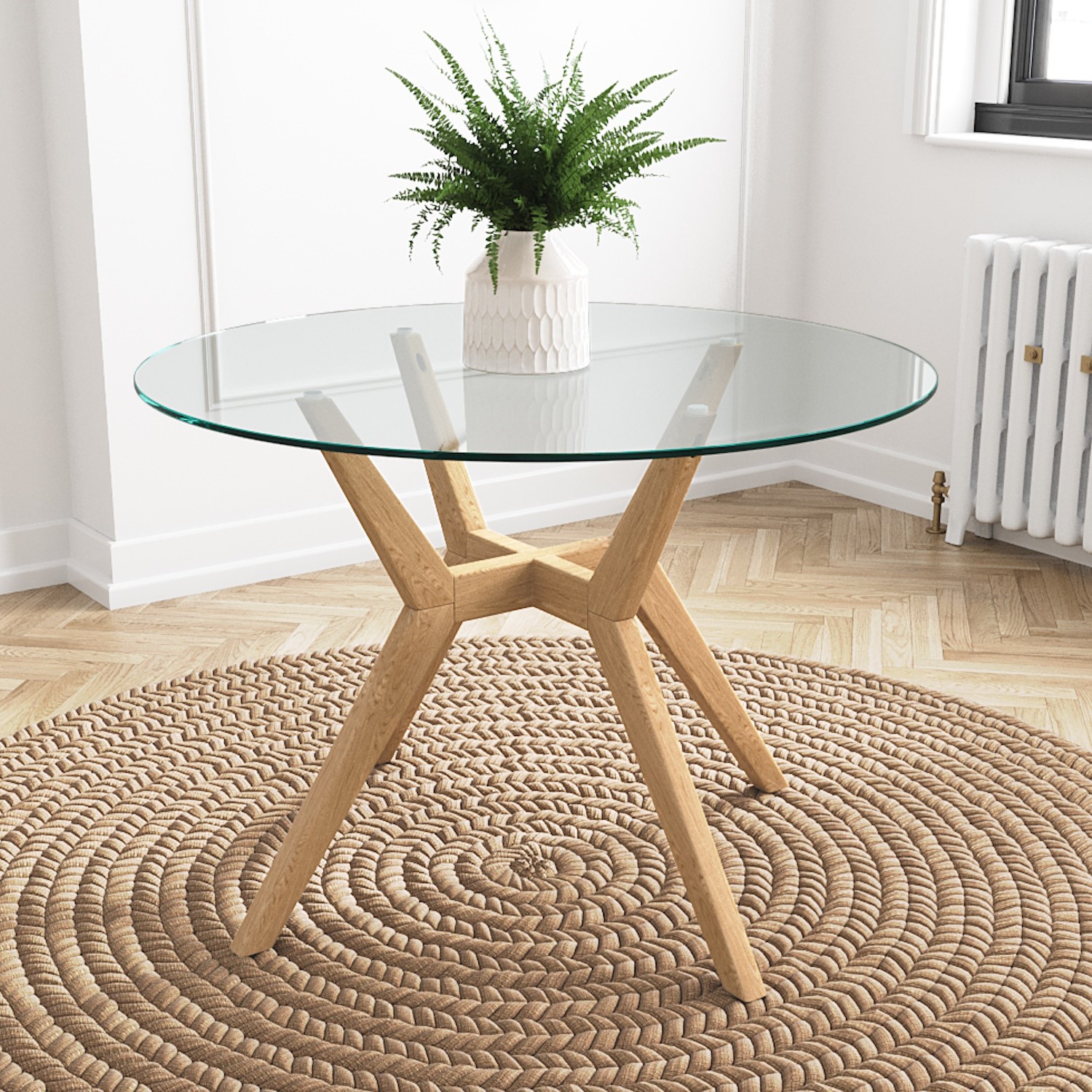 Photo of Large round glass top dining table with oak legs - seats 4 - nori