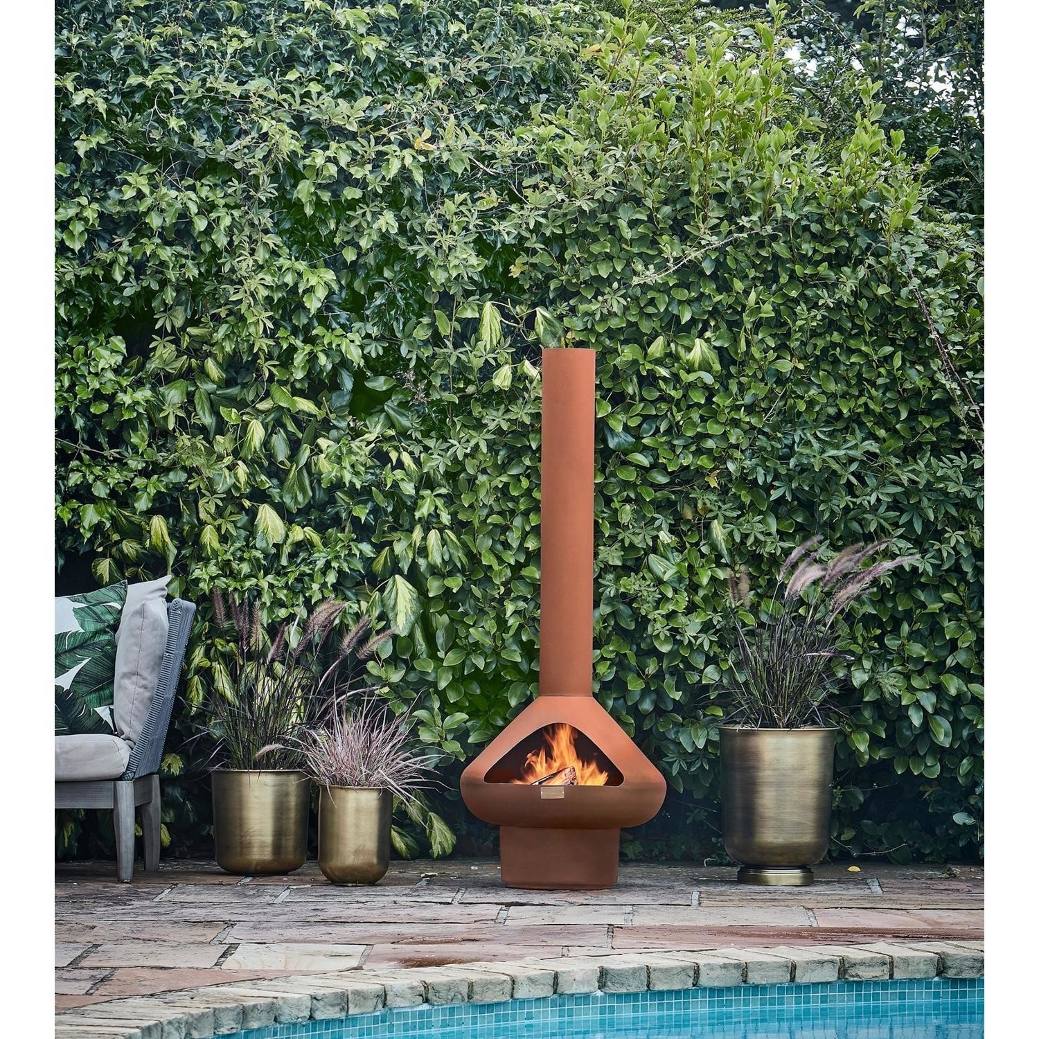 Photo of Ivyline outdoor fornax fireplace in rust