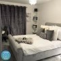GRADE A2 - Safina Roll Top Double Sleigh Bed in Grey Velvet
