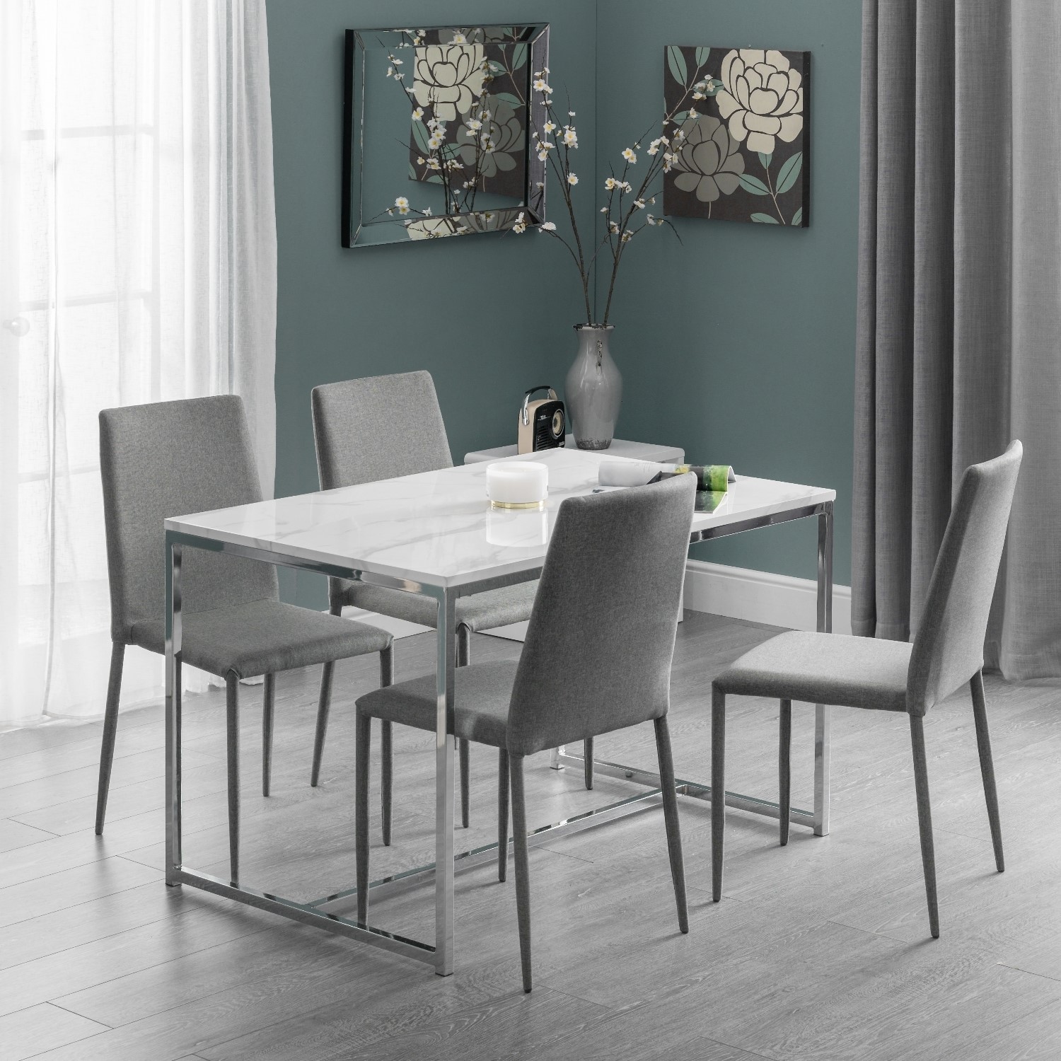 white marble dining table with 4 grey dining chairs  julian bowen scala