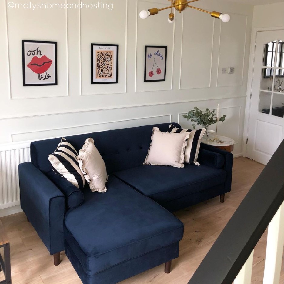 Left Hand Facing Navy Blue Velvet Corner Sofa with Bolster Cushions