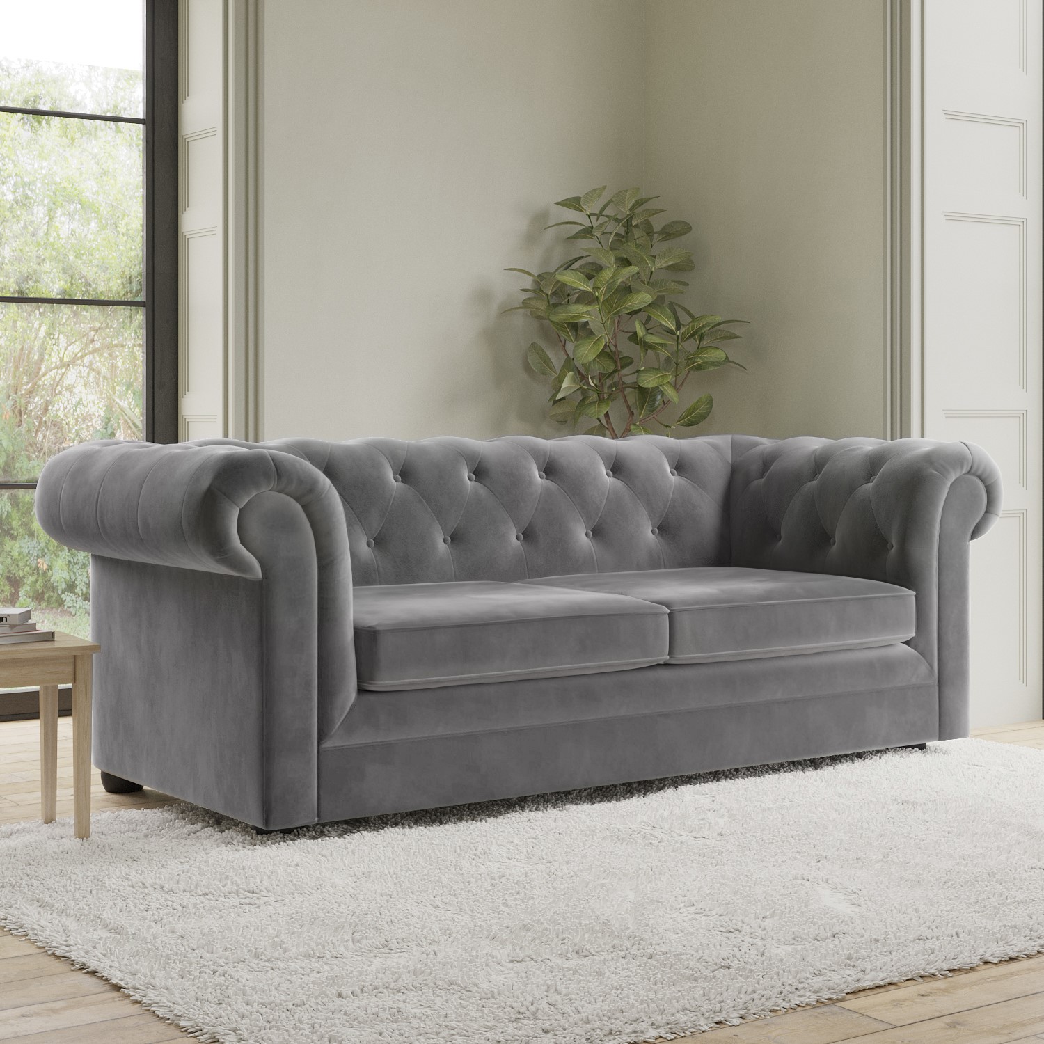 Photo of Grey velvet chesterfield pull out sofa bed - seats 3 - bronte