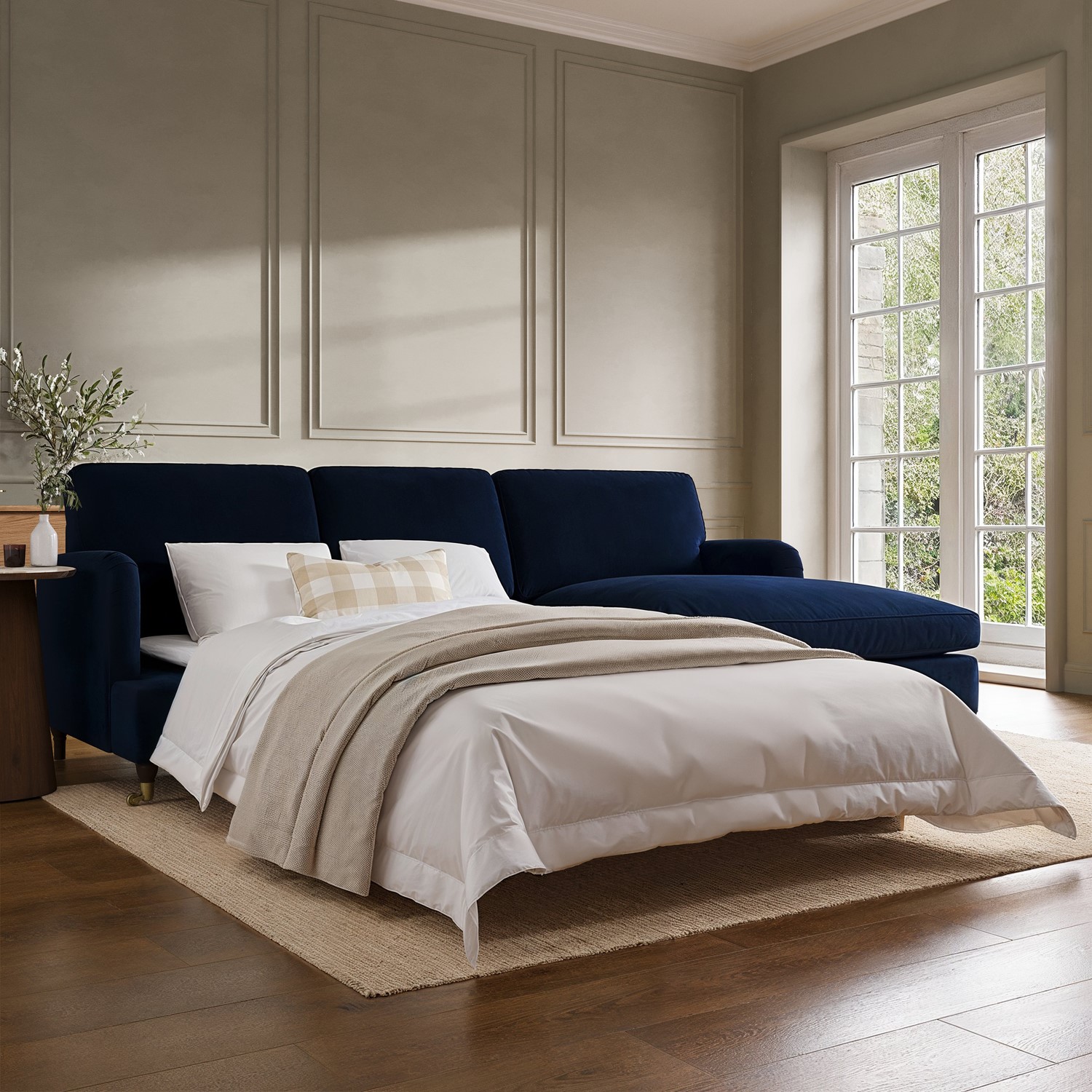Payton Blue 4 Seater Pull-Out Chaise Corner Sofa Bed In Navy Velvet